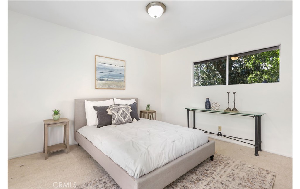 1237 Olive Lane La Canada Flintridge, CA 91011 - Photo 39 of 57 a bedroom with a bed and a window