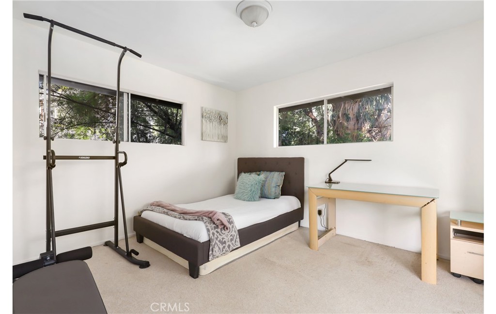 1237 Olive Lane La Canada Flintridge, CA 91011 - Photo 42 of 57 a bedroom with a bed and large window