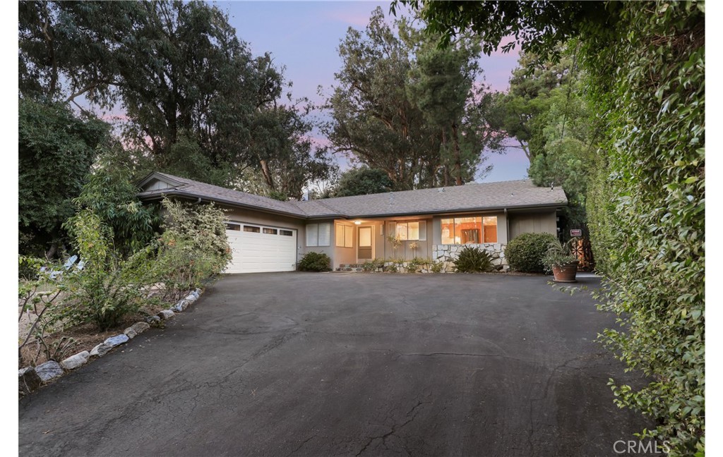 1237 Olive Lane La Canada Flintridge, CA 91011 - Photo 44 of 57 a view of a house with large tree and a yard