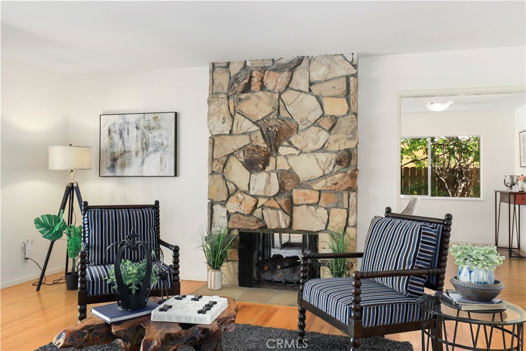1237 Olive Lane La Canada Flintridge, CA 91011 - Photo 9 of 57 a living room with furniture and a fireplace