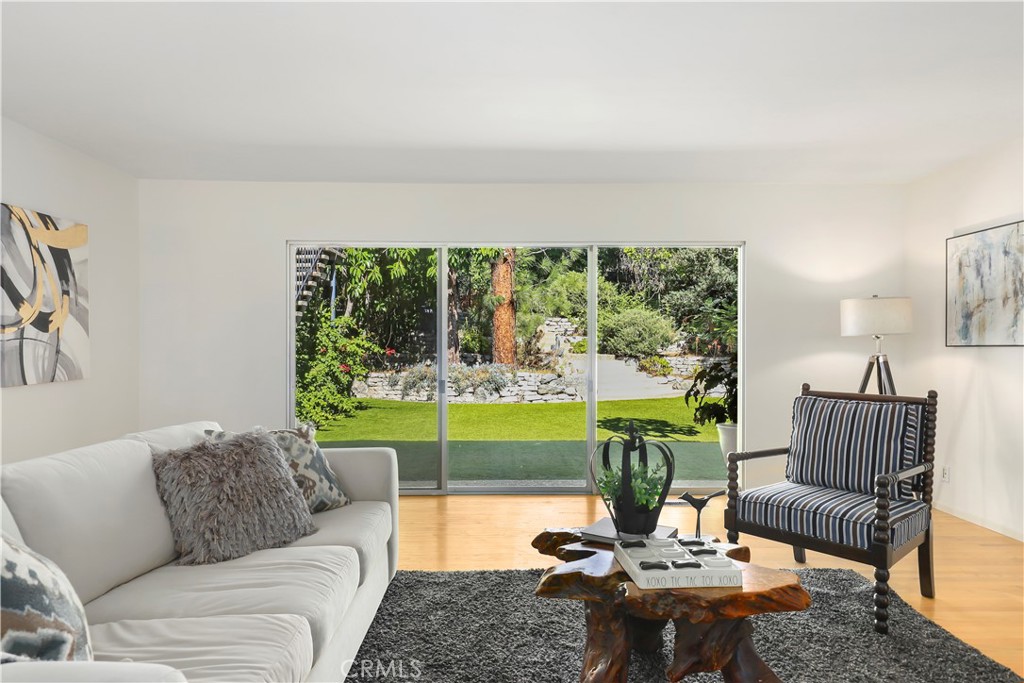 1237 Olive Lane La Canada Flintridge, CA 91011 - Photo 10 of 57 a living room with furniture and a large window