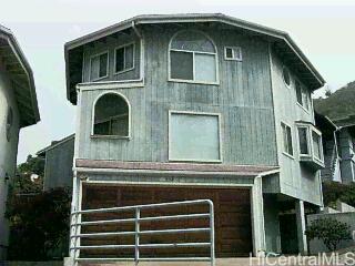 a front view of a house with windows