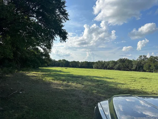 a view of an ocean from a yard