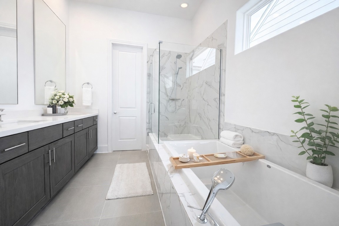 737 Bringhurst Street Houston, TX 77020 - Photo 7 of 13 Frameless shower door, 6' tub, (not freestanding), and separate toilet room.
Similar plan and finishes.