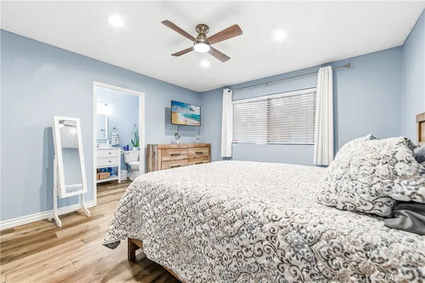 a bedroom with a bed and a walk in closet