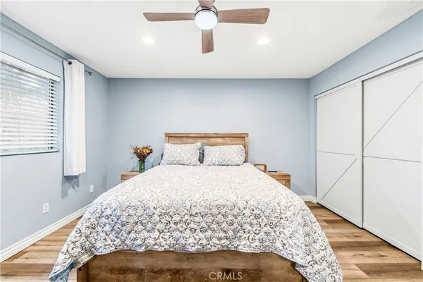 a view of a cars park in front of a building