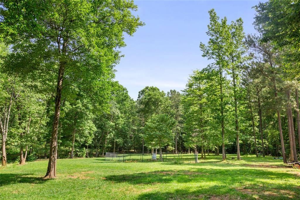 3030 Demooney Road College Park, GA 30349 - Photo 5 of 35 a view of a park with a tree in the background