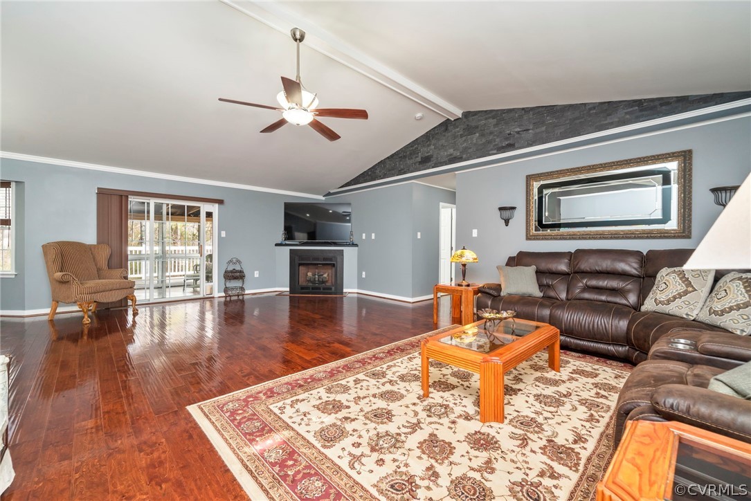 12311 Lewis Road Chester, VA 23831 - Photo 8 of 30 a living room with furniture and a wooden floor