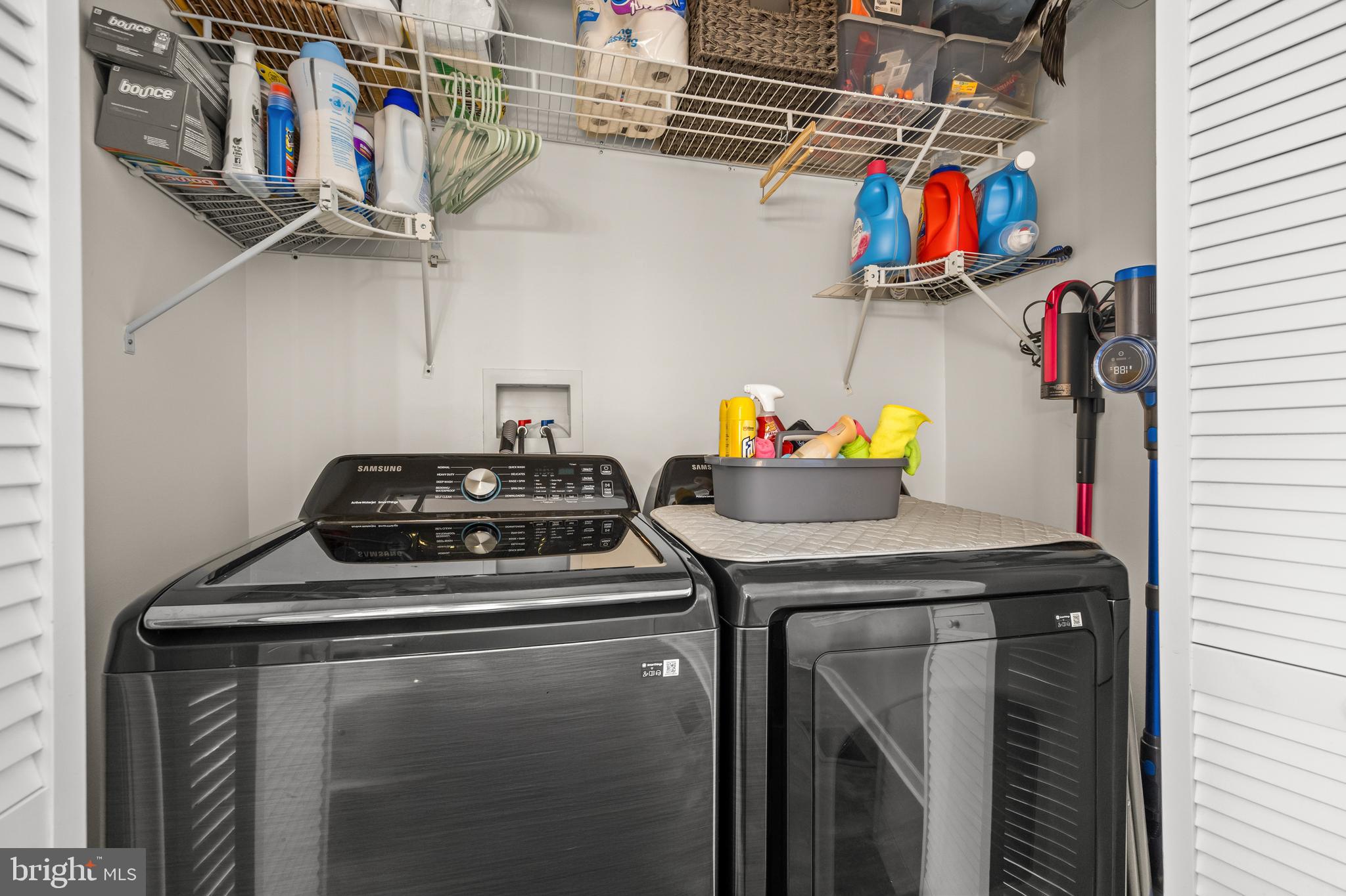 2191 Garwood Road Sicklerville, NJ 08081 - Photo 15 of 36 a utility room with dryer washer and shoe rack