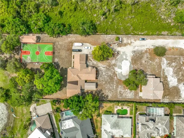 an aerial view of a houses with outdoor space