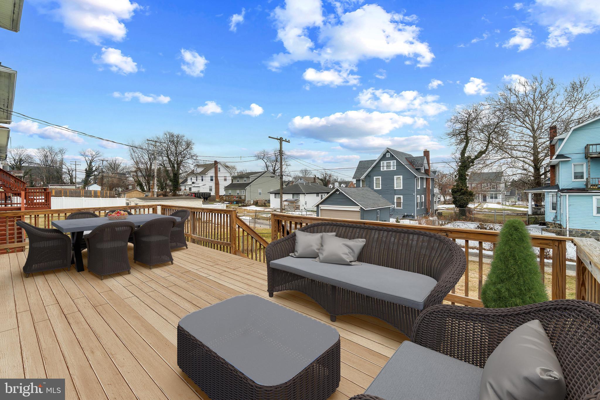 4021 Barrington Road Baltimore, MD 21207 - Photo 35 of 50 a view of a terrace with couches and sky view