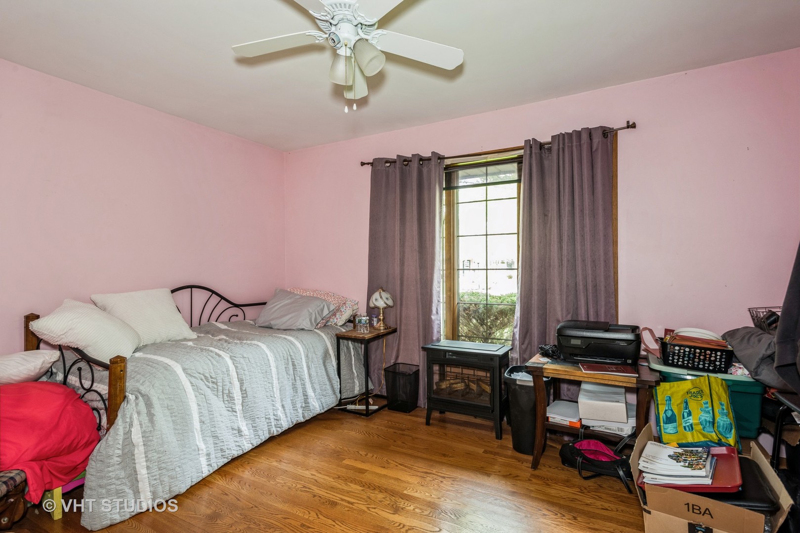717 North Broadway Avenue Park Ridge, IL 60068 - Photo 8 of 18 a bedroom with a bed and a chandelier
