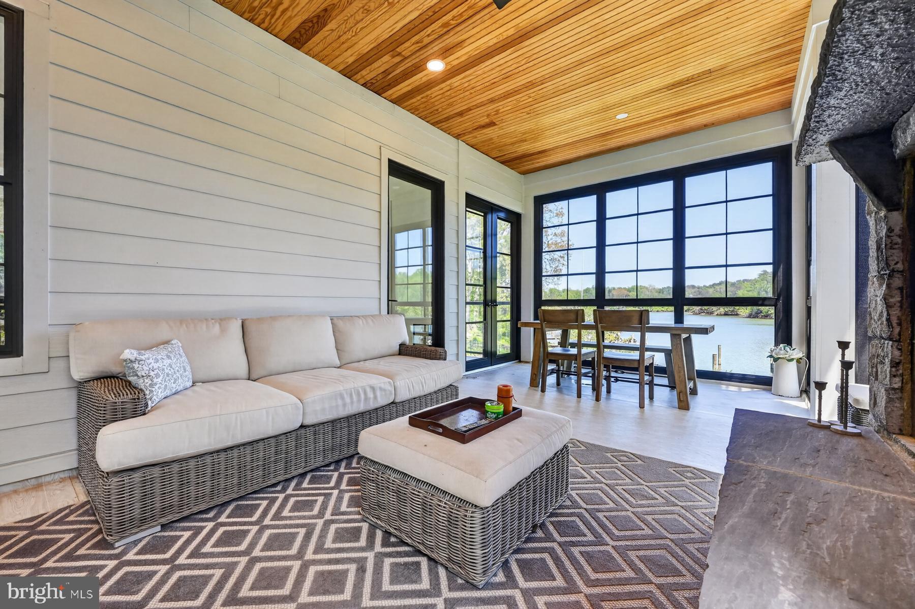 3275 Harness Creek Road Annapolis, MD 21403 - Photo 22 of 40 Casual dining and seating on the porch