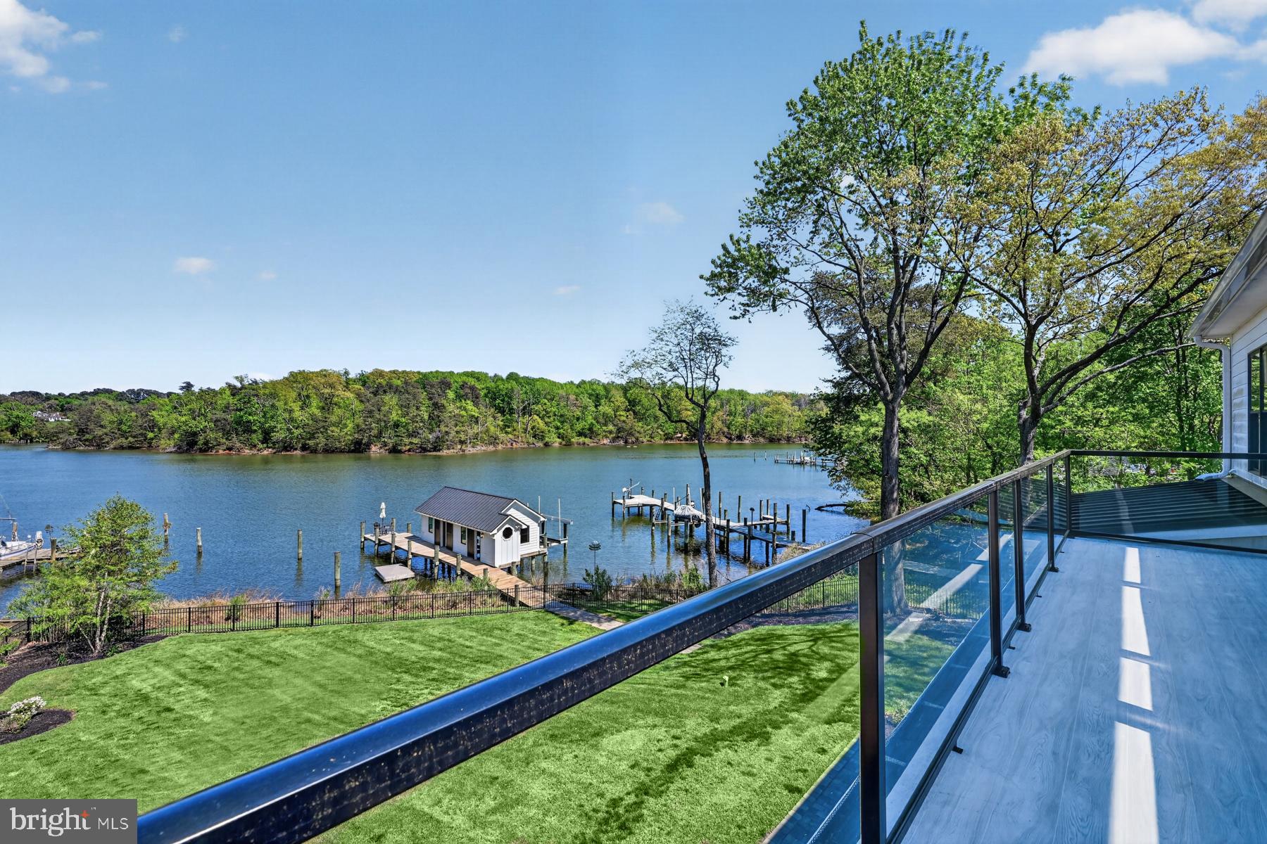 3275 Harness Creek Road Annapolis, MD 21403 - Photo 36 of 41 a view of a deck with a lake view