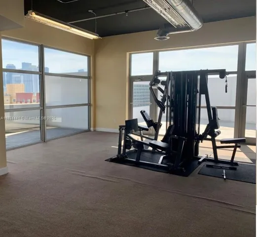 a view of a room with gym equipment