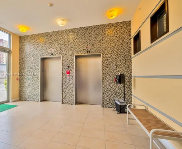 a view of city with tall buildings