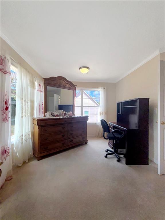 235 Shiver Boulevard Covington, GA 30016 - Photo 16 of 27 a living room with furniture and a flat screen tv