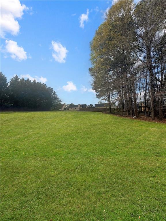 235 Shiver Boulevard Covington, GA 30016 - Photo 27 of 27 a view of a green field