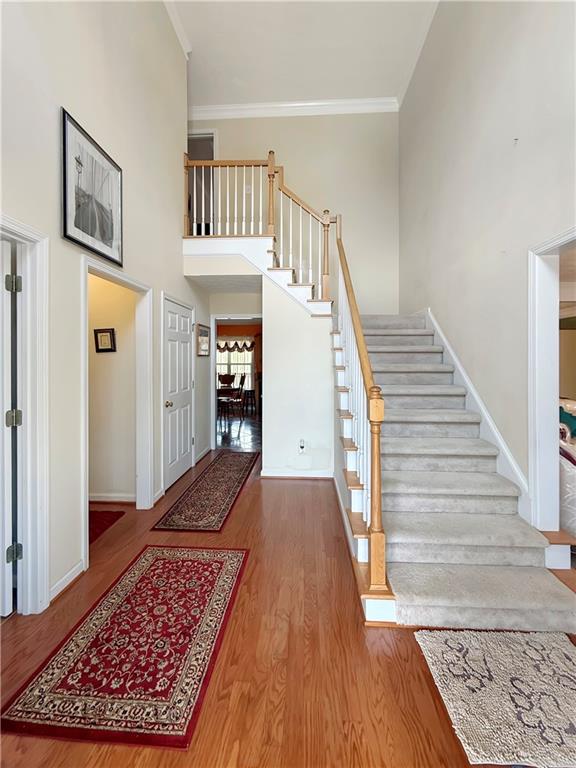 235 Shiver Boulevard Covington, GA 30016 - Photo 4 of 27 a view of entryway and hall with wooden floor