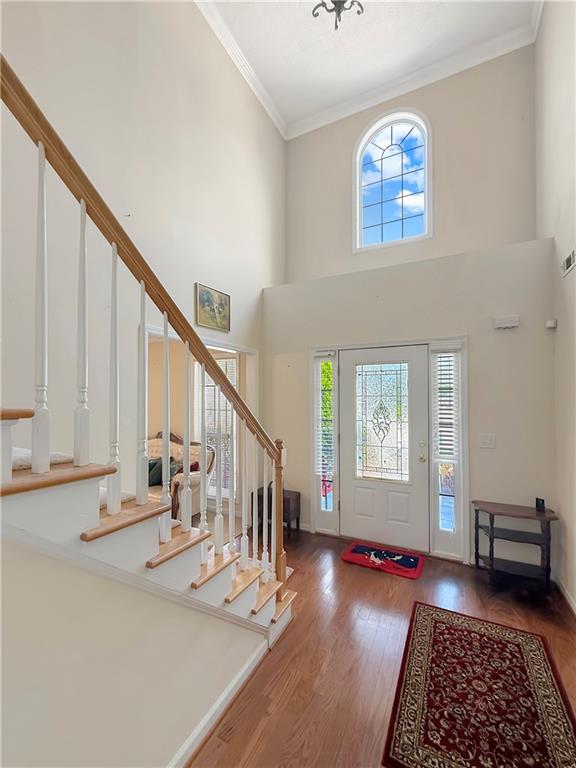 235 Shiver Boulevard Covington, GA 30016 - Photo 5 of 27 a view of an entryway with wooden floor