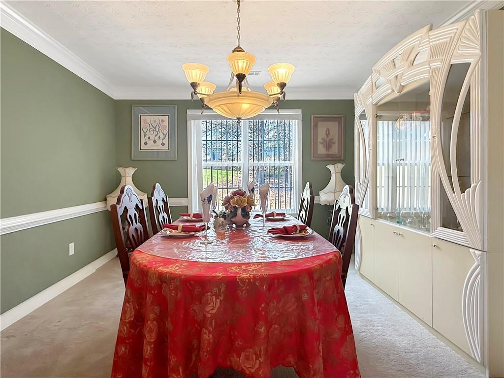 235 Shiver Boulevard Covington, GA 30016 - Photo 7 of 27 a view of a dining room with furniture window and outside view