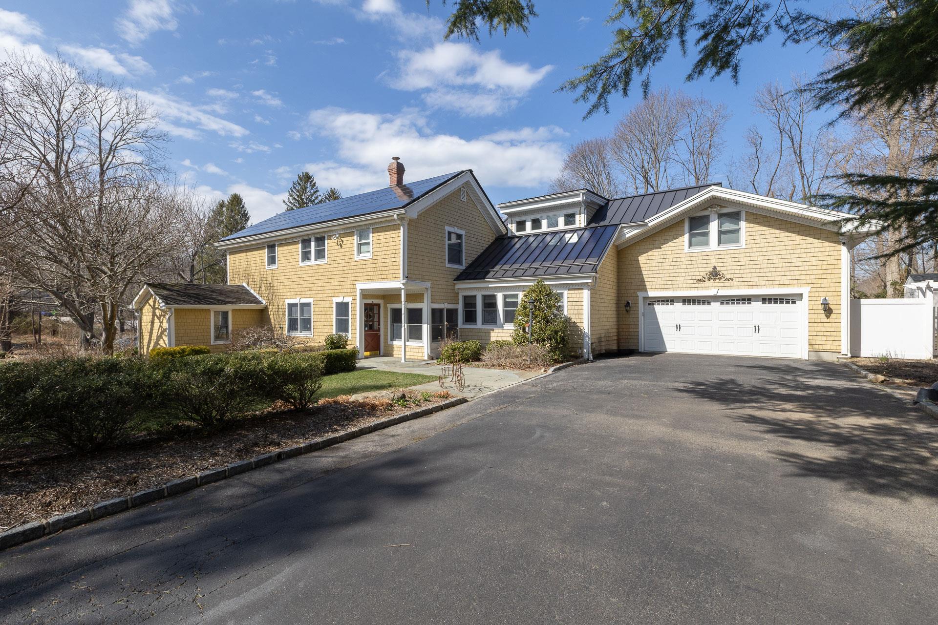 67 Gnarled Hollow Road Setauket, NY 11733 - Photo 1 of 1 a front view of a house with a yard
