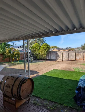 a house with garden in front of it
