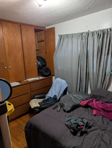 a room with furniture and a window