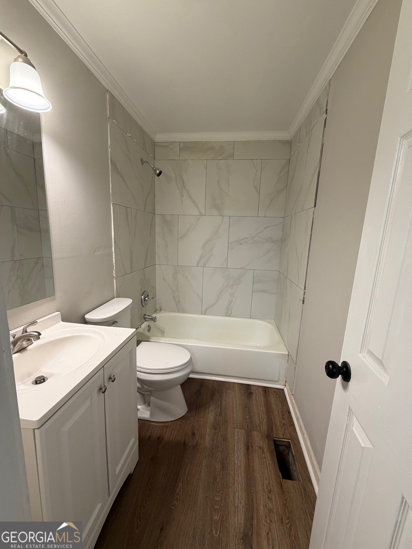 21 Opal Street Luthersville, GA 30251 - Photo 17 of 26 a bathroom with a sink a toilet and shower
