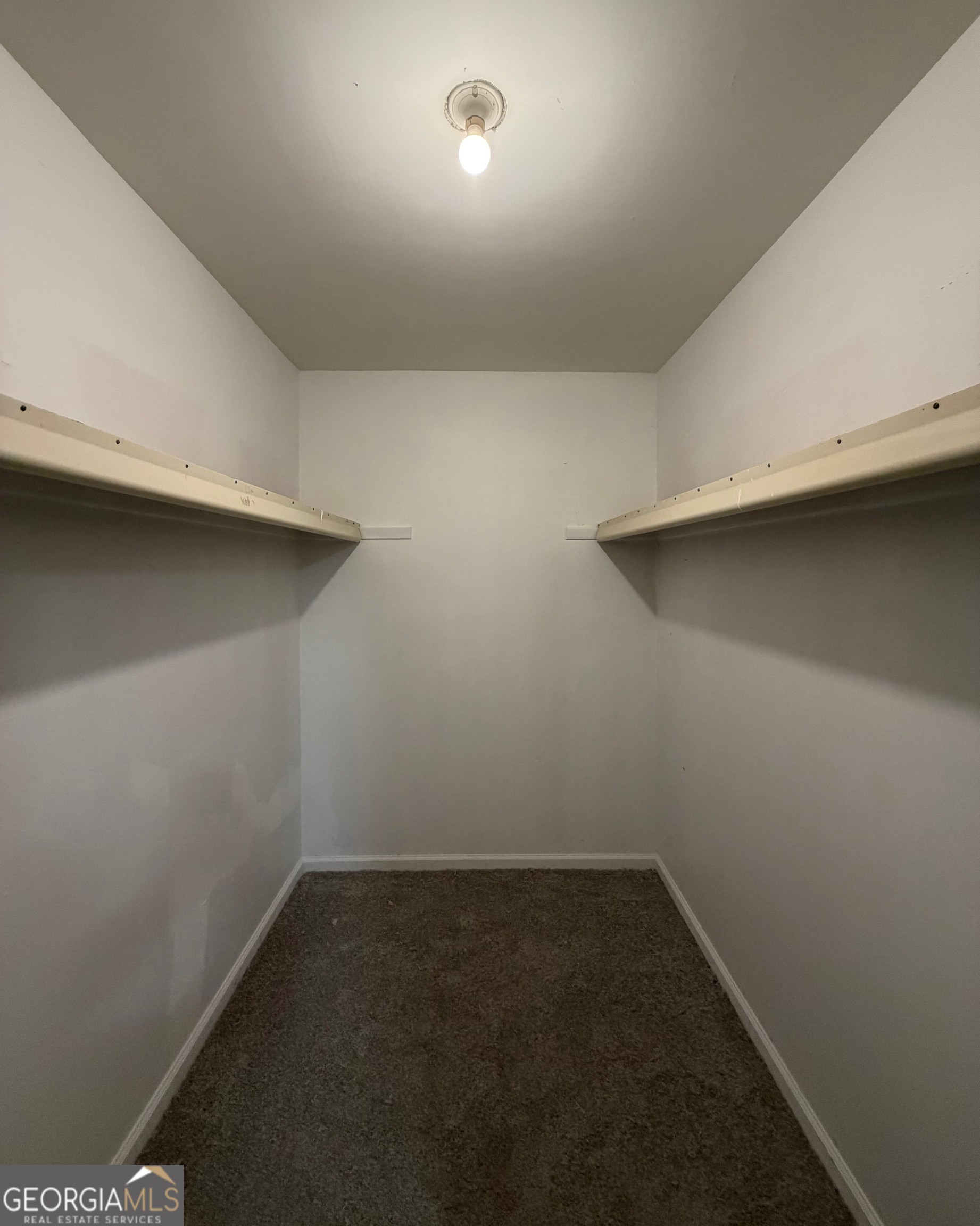 21 Opal Street Luthersville, GA 30251 - Photo 20 of 26 an empty room with a hallway and a window