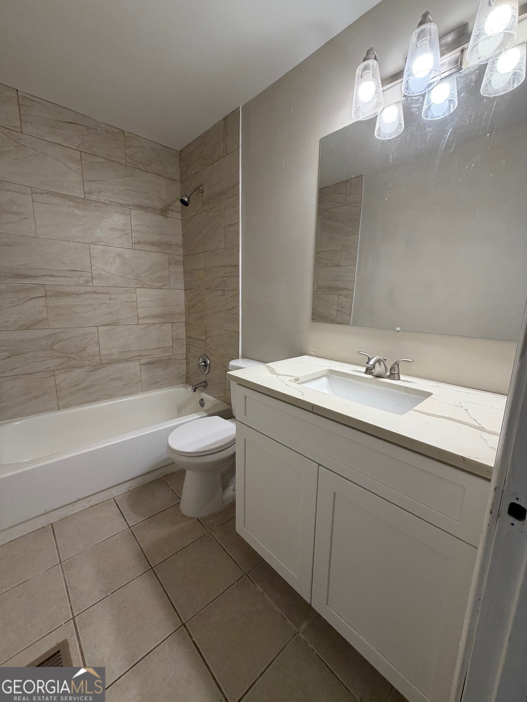21 Opal Street Luthersville, GA 30251 - Photo 25 of 26 a bathroom with a sink a toilet and shower