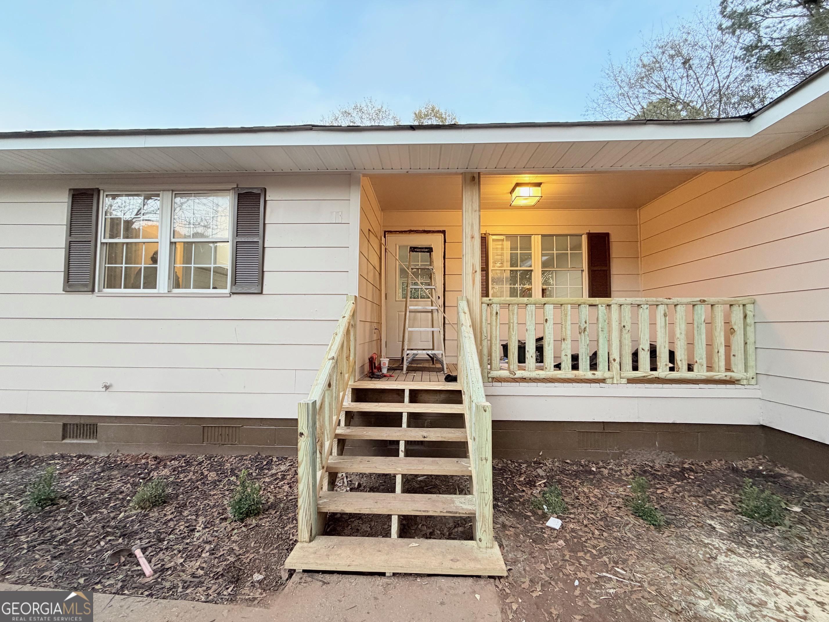 21 Opal Street Luthersville, GA 30251 - Photo 3 of 26 a view of a house with wooden stairs