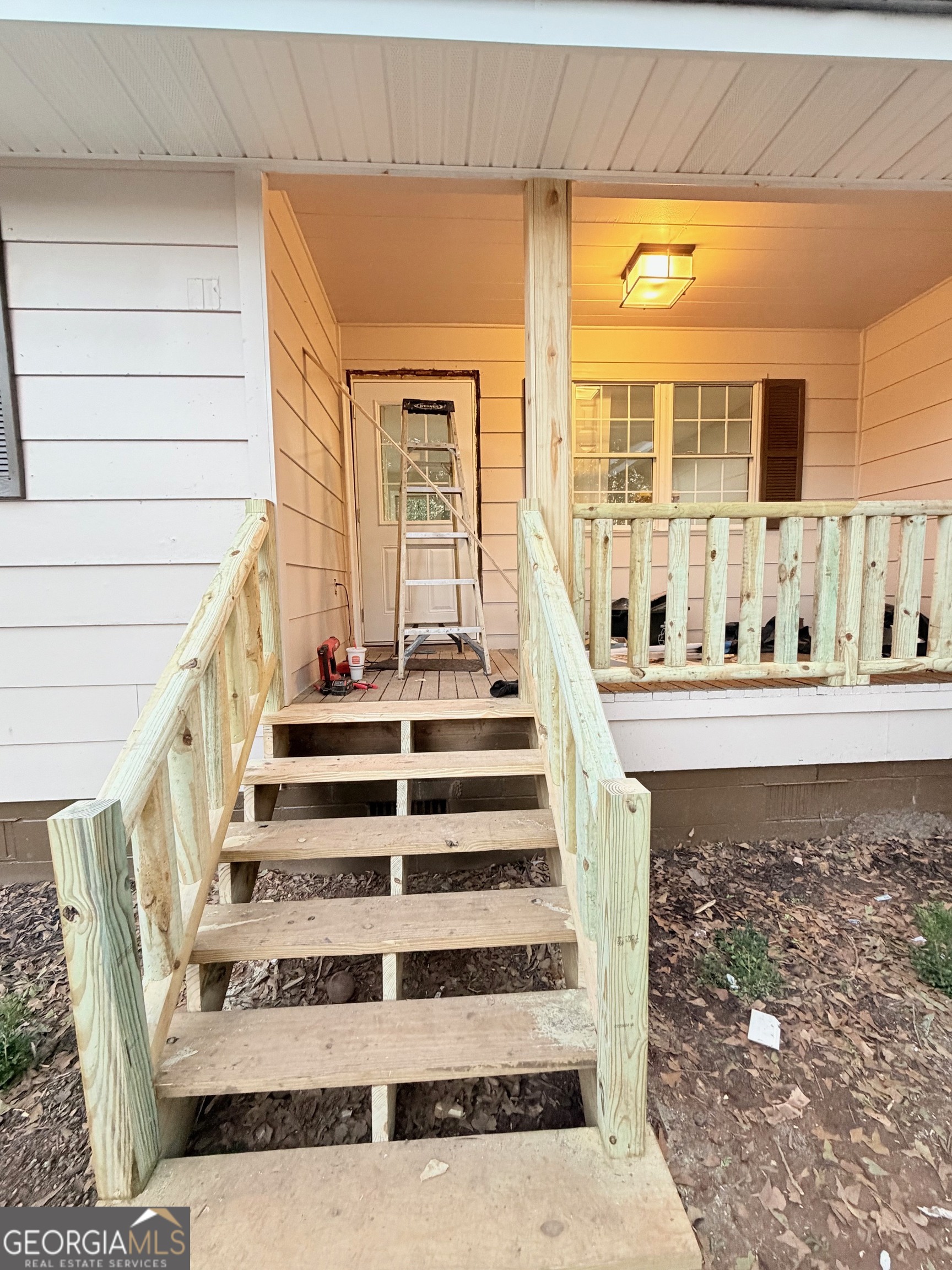 21 Opal Street Luthersville, GA 30251 - Photo 4 of 26 a view of entryway with wooden floor and windows