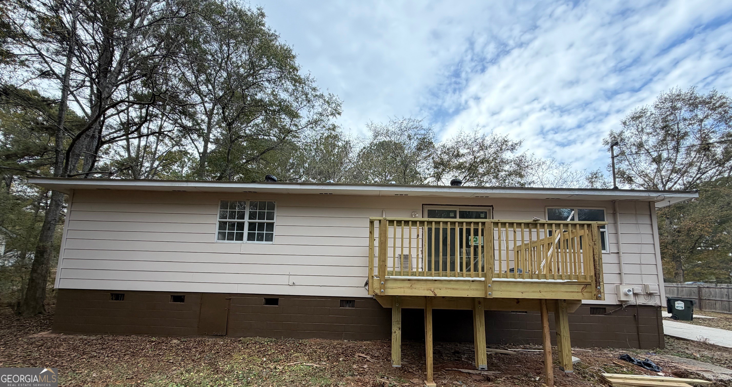 21 Opal Street Luthersville, GA 30251 - Photo 8 of 26 a view of a house with a balcony