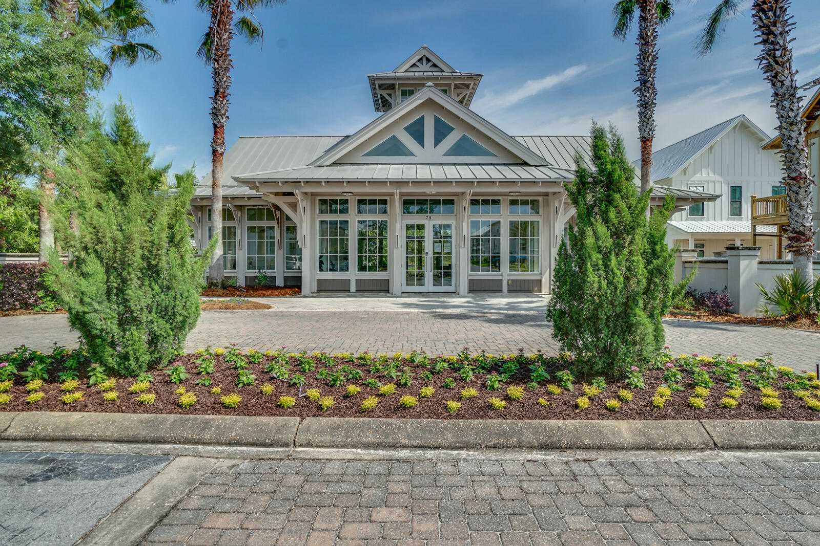 101 Grande Pointe Cir Inlet Beach Inlet Beach, FL 32461 - Photo 12 of 16 a front view of a house with a garden