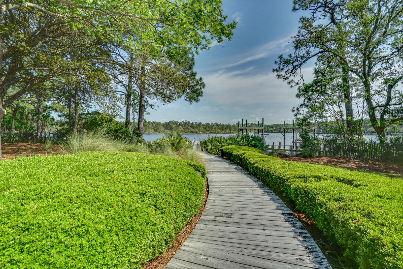 101 Grande Pointe Cir Inlet Beach Inlet Beach, FL 32461 - Photo 9 of 16 a view of a lake with a garden