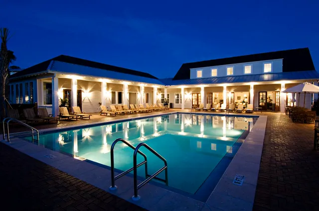a view of swimming pool with chairs