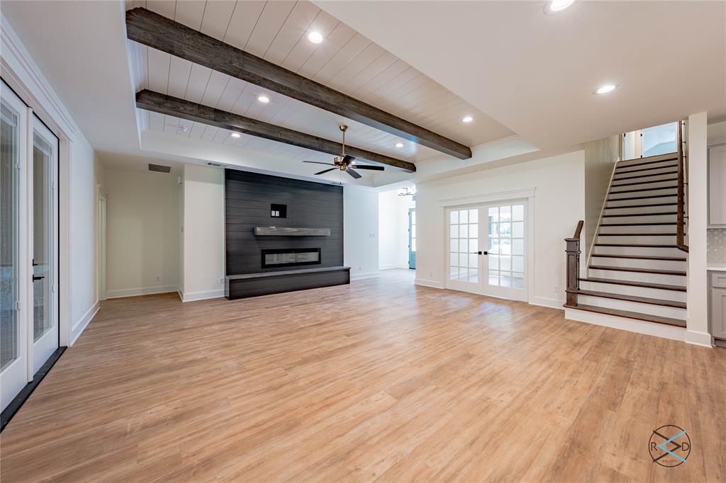 114 Castlewood Road Enchanted Oaks, TX 75156 - Photo 12 of 24 a view of empty room with wooden floor