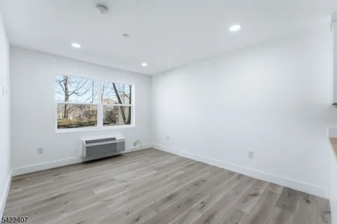 a view of workspace with wooden floor