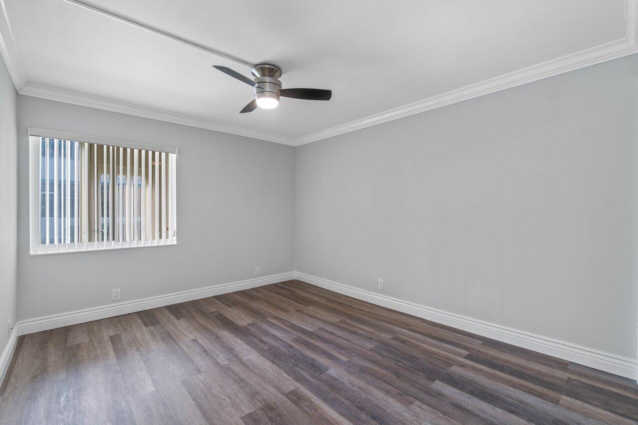 637 Normandy Lane, Unit N Delray Beach, FL 33484 - Photo 15 of 30 primary bedroom