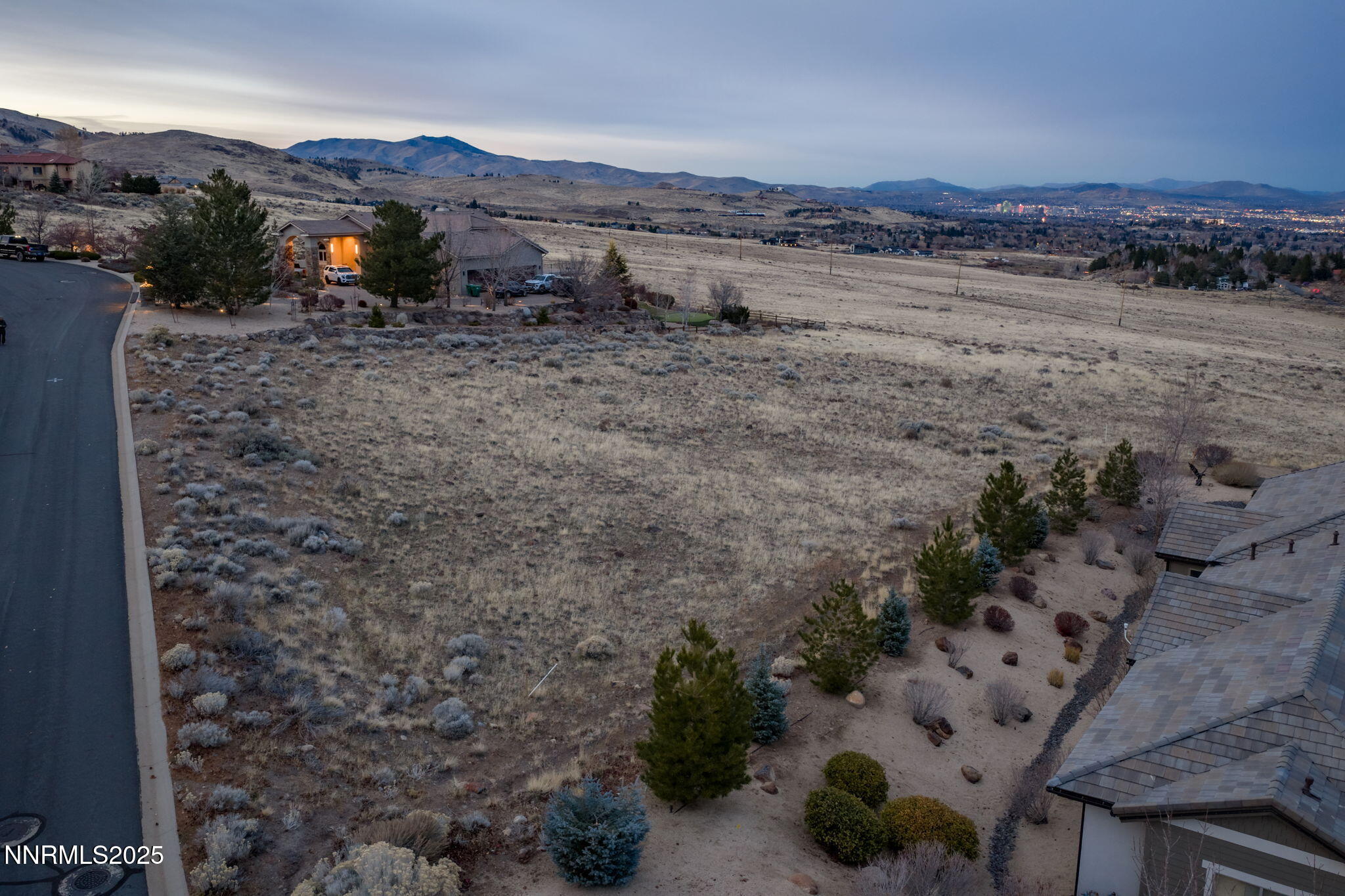 390 Questa Court Reno, NV 89511 - Photo 17 of 29 a view of a dry yard with mountain