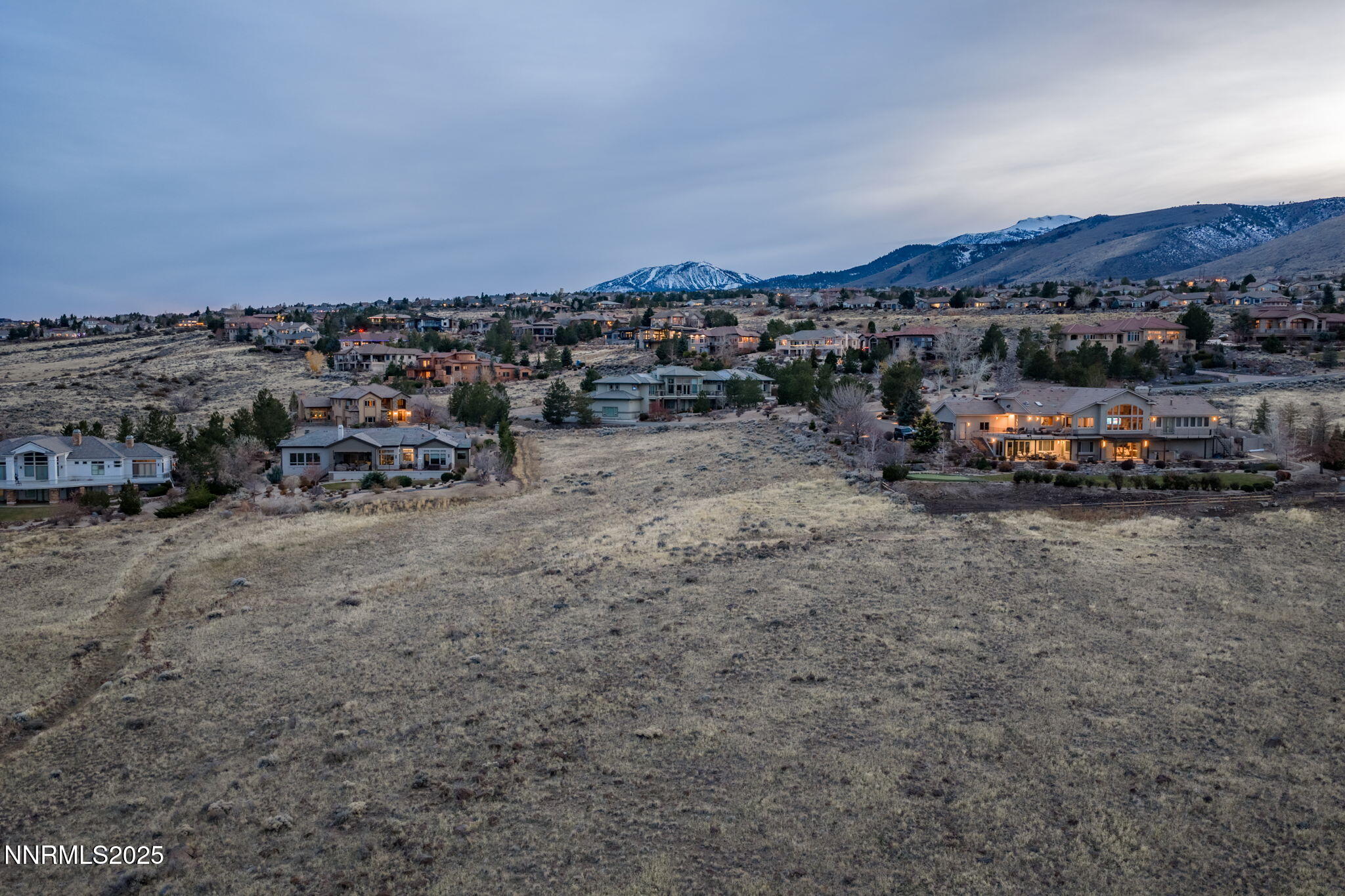 390 Questa Court Reno, NV 89511 - Photo 21 of 29 an aerial view of a car parked on the side of the road