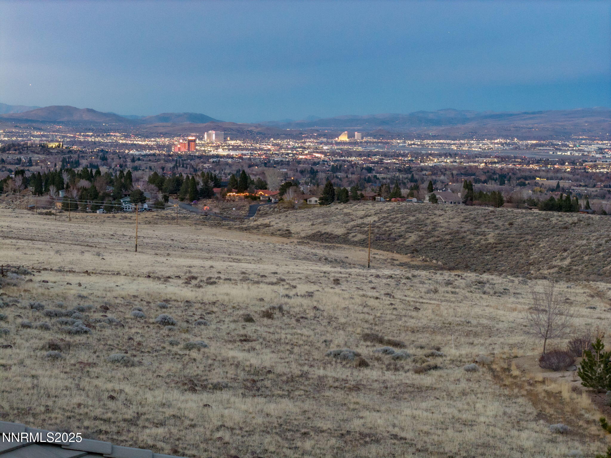 390 Questa Court Reno, NV 89511 - Photo 23 of 29 a view of a dry yard with mountain