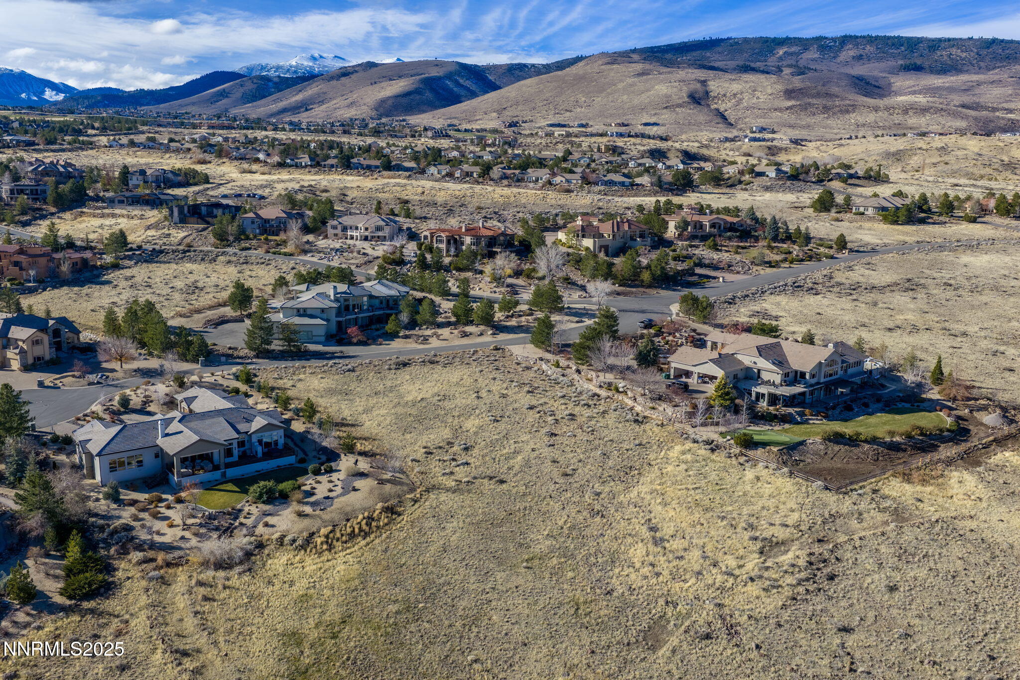 390 Questa Court Reno, NV 89511 - Photo 7 of 29 an aerial view of residential houses with outdoor space