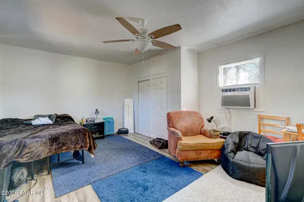 a kitchen with stainless steel appliances a stove a sink and a refrigerator