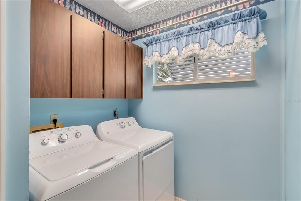 8156 Southwest 108th Ln Road Ocala, FL 34481 - Photo 29 of 50 a utility room with dryer and washer