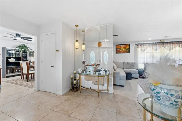 a living room with furniture and a table