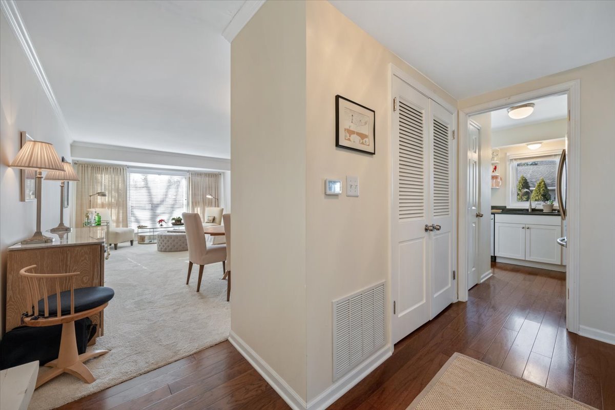 601 Ridge Road, Unit 202 Wilmette, IL 60091 - Photo 13 of 17 a view of a livingroom with furniture and hardwood floor