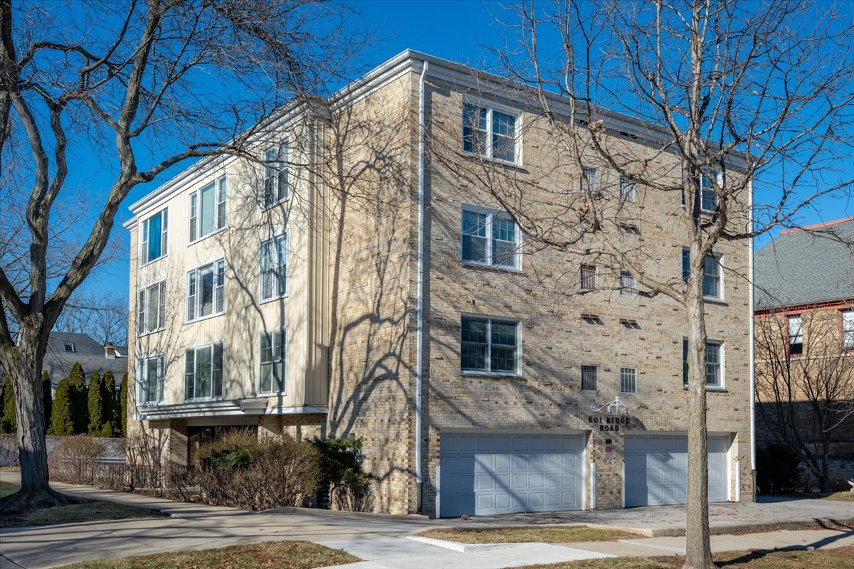 601 Ridge Road, Unit 202 Wilmette, IL 60091 - Photo 2 of 17 a front view of a building with a street