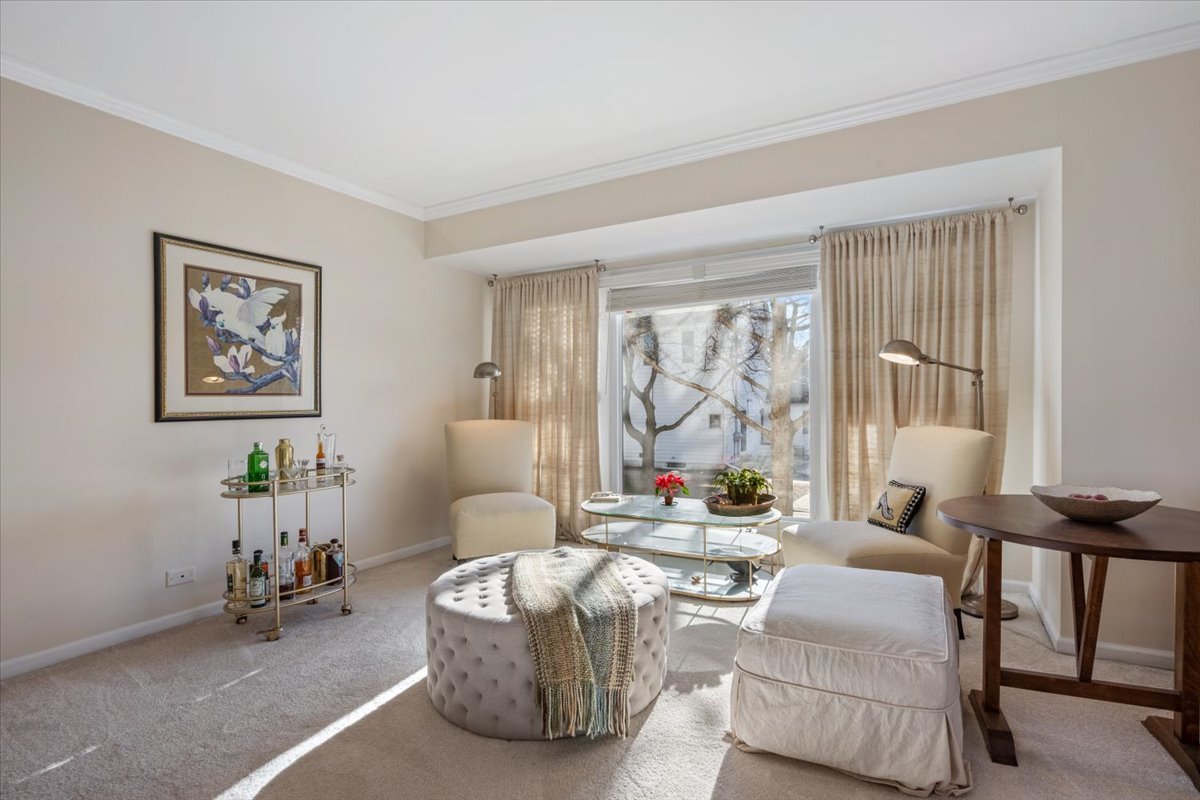 601 Ridge Road, Unit 202 Wilmette, IL 60091 - Photo 3 of 17 a living room with furniture and a window